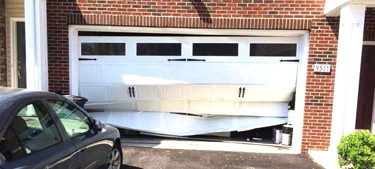 Professional technicians installing a durable, modern garage door as part of a garage door replacement, improving home security, energy efficiency, and curb appeal."