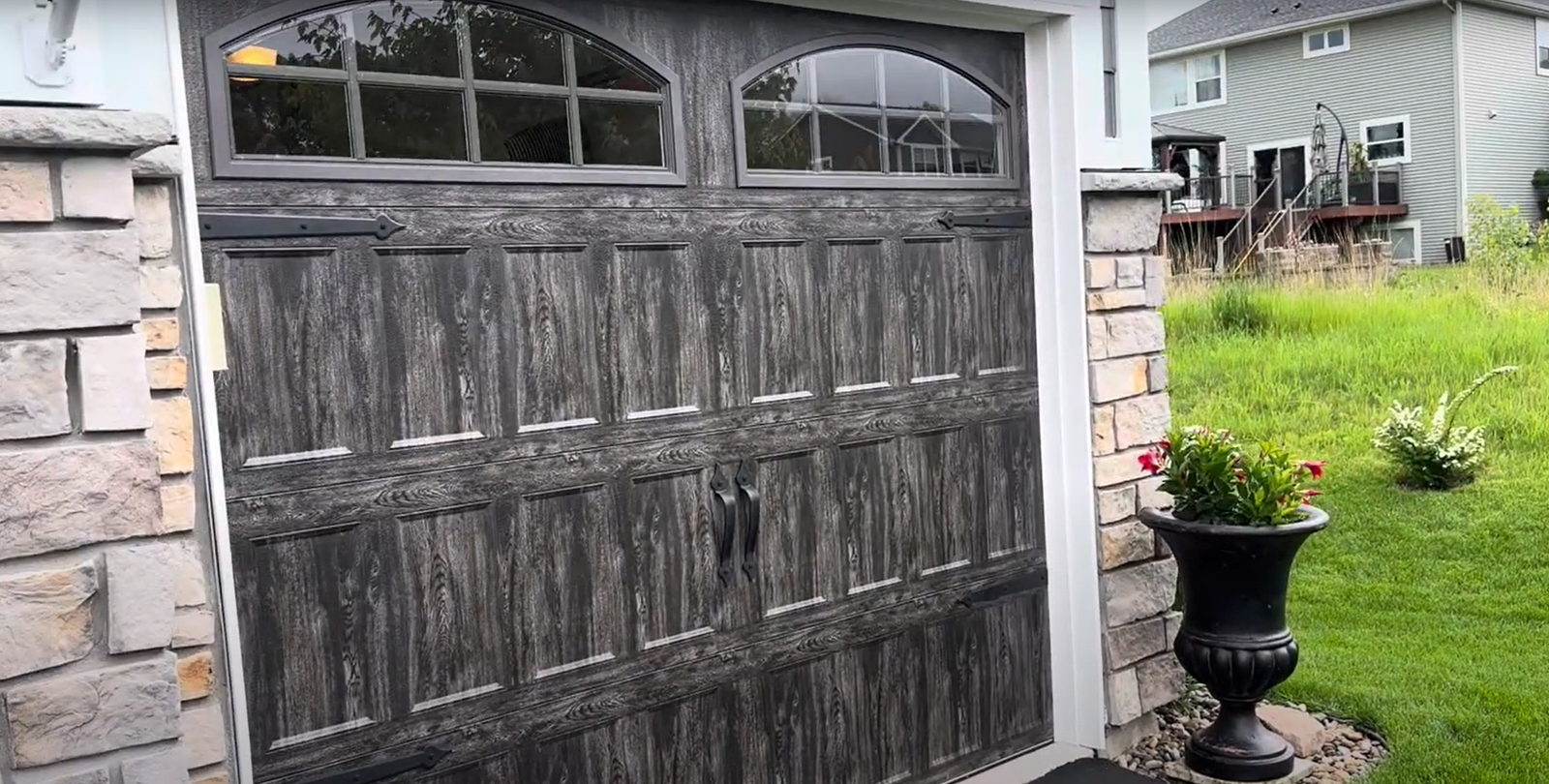 Technician performing a same-day garage door repair for Expert Garage Door Repair, showcasing professional and efficient service.